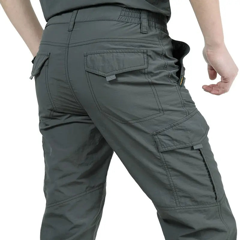 New Mens Tactical Pants Multiple Pocket Elasticity Military Urban Commuter Tacitcal Trousers Men Slim Fat Cargo Pant 5XL