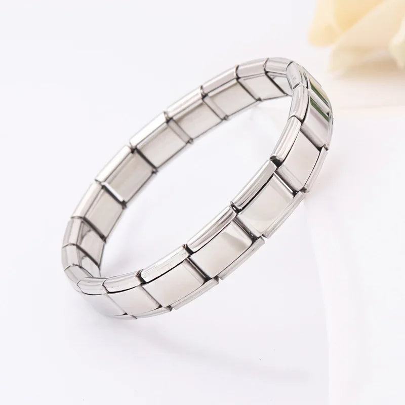 Product Name: Moonstone Stainless Steel Carving Bracelet  Material: Stainless steel  Size: 17.5 centimeters long  Color: Steel